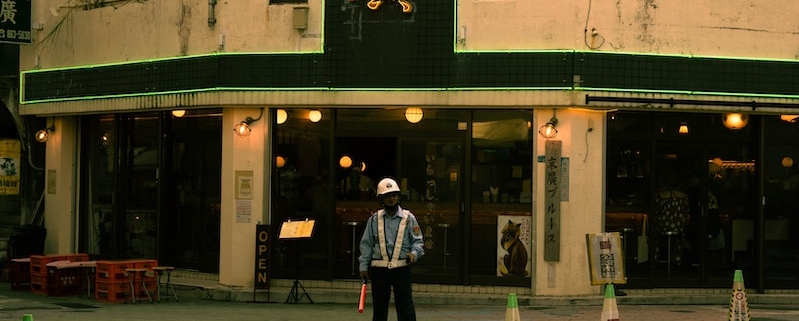 a person standing in front of a building