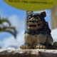 gold lion statue on gray concrete surface